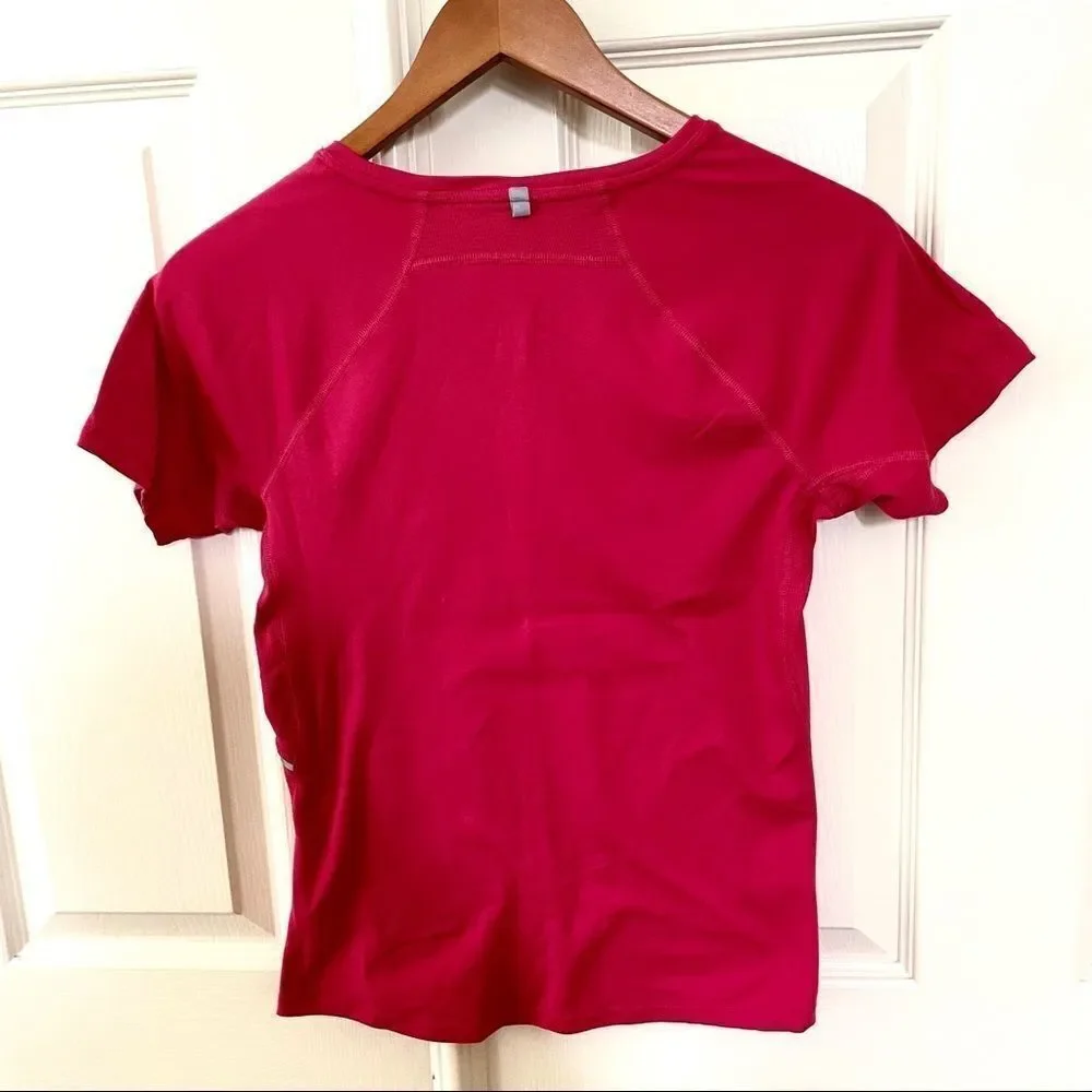 Nike pink Dri-fit short sleeved top